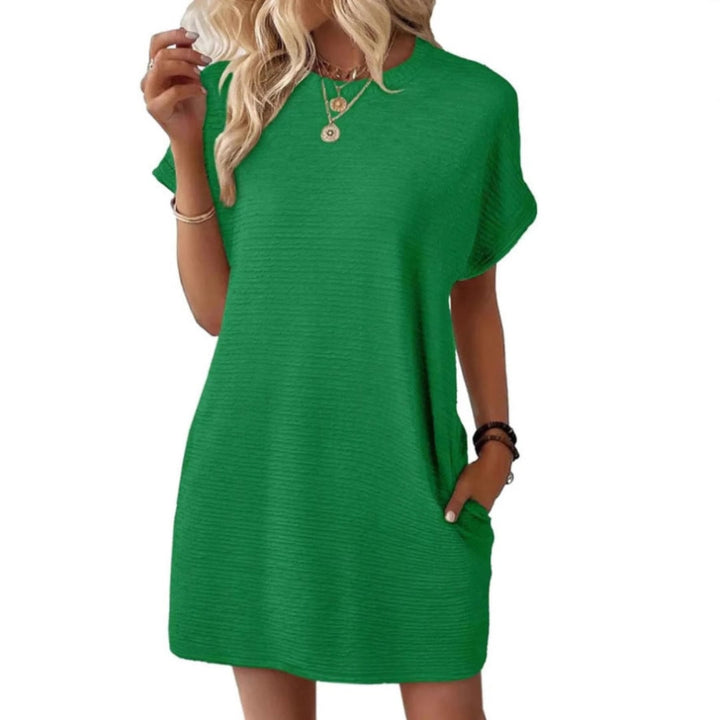 Group of Maggie mini dresses displayed in multiple color options including Apricot and Light Green