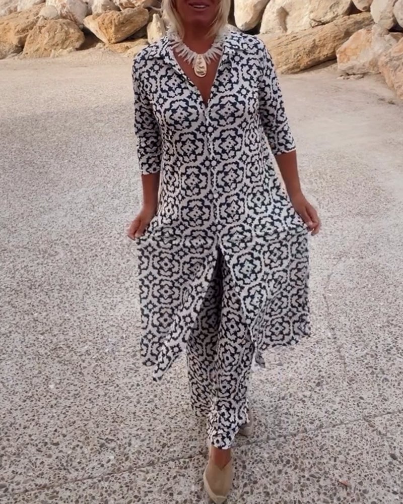 Woman wearing the Mosa fuchsia geometric print longline shirt and straight-leg pants two-piece set, front view