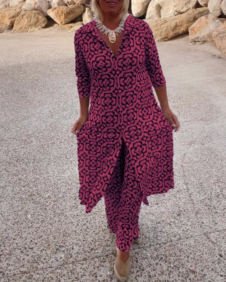 Woman wearing the Mosa two-piece set in fuchsia, showing the button-front shirt open over matching trousers