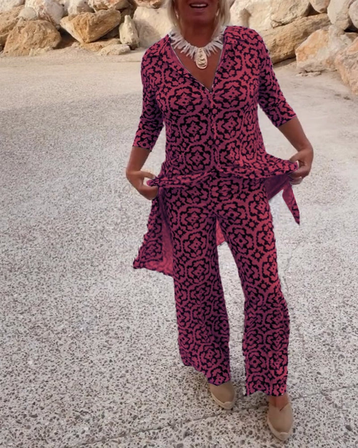 Woman wearing the Mosa two-piece set in green geometric print, full-length front view