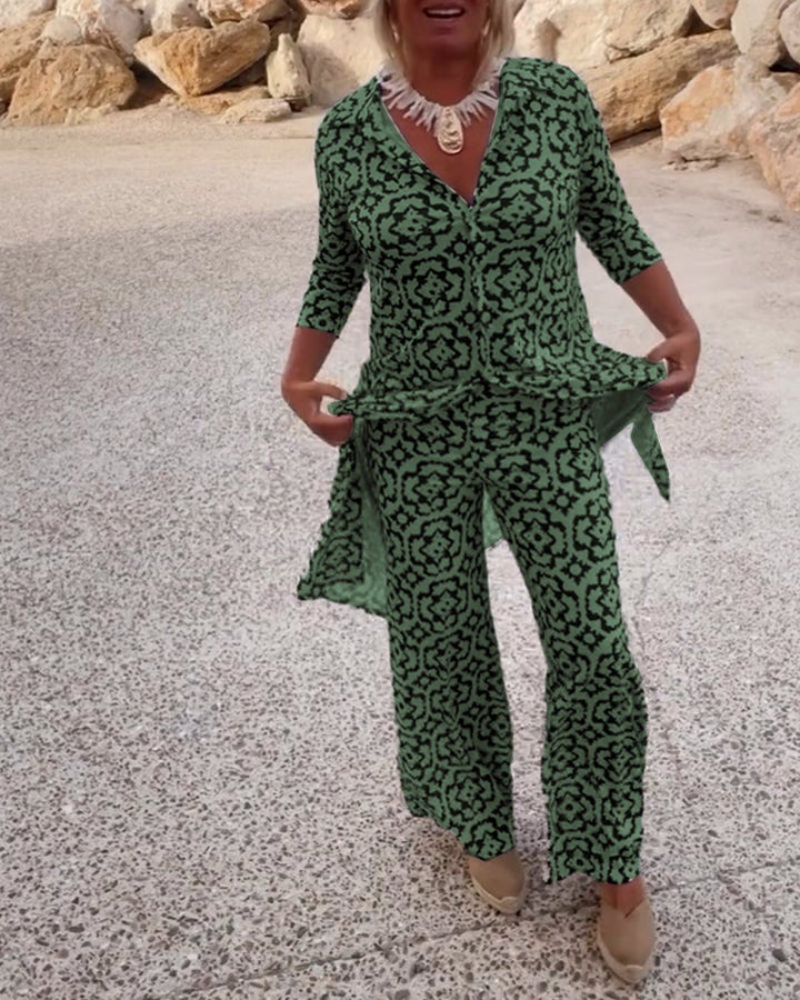 Close-up of the Mosa green medallion print fabric and three-quarter sleeve detail