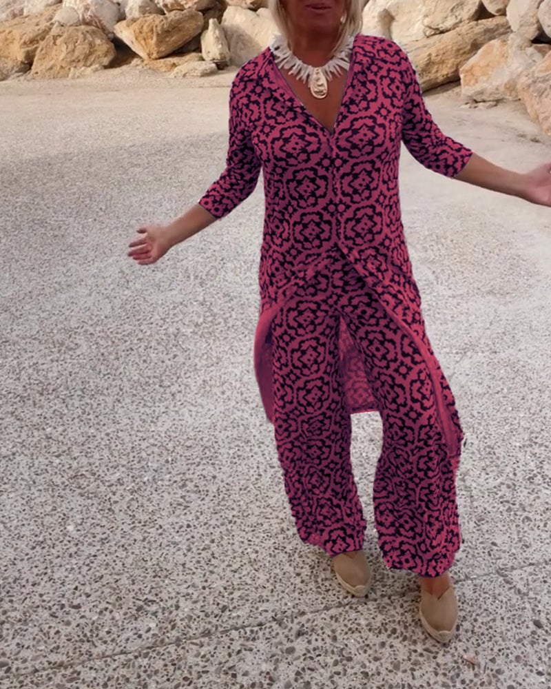 Woman styling the Mosa green printed longline shirt open over the matching straight-leg pants