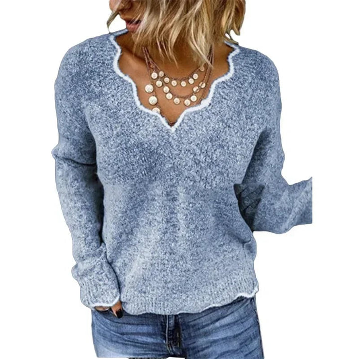 Model wearing the Nora elegant sweater in black, showcasing its versatile and sophisticated design