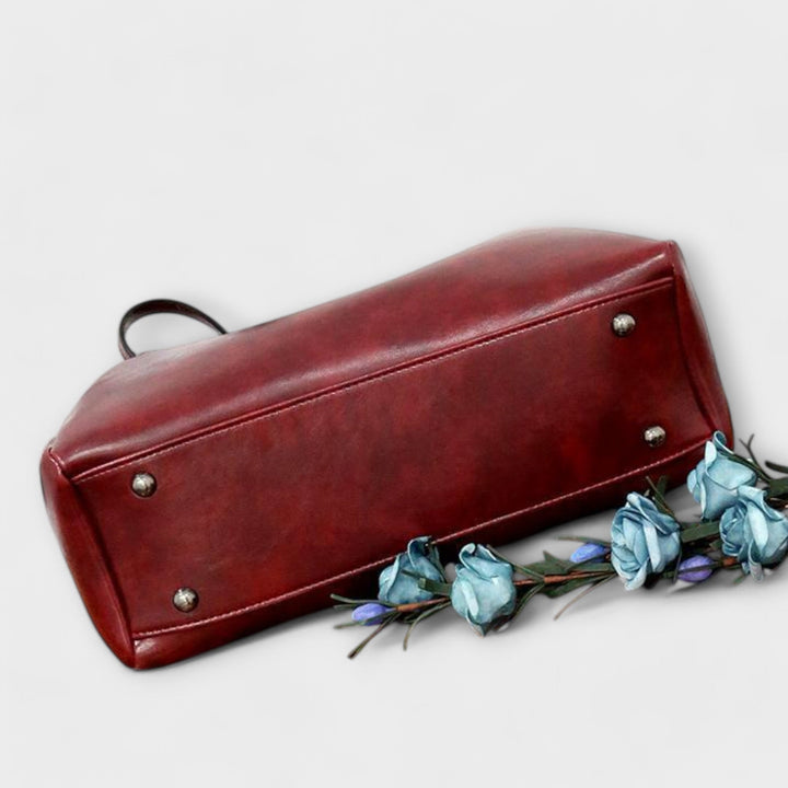 Olivia 4-piece vintage bag set in gray displayed on a wooden surface