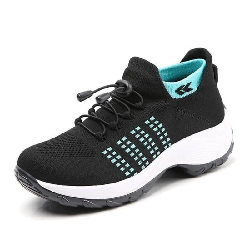 OrthoLuxe women's comfort shoes in black and teal colorway, angled front view