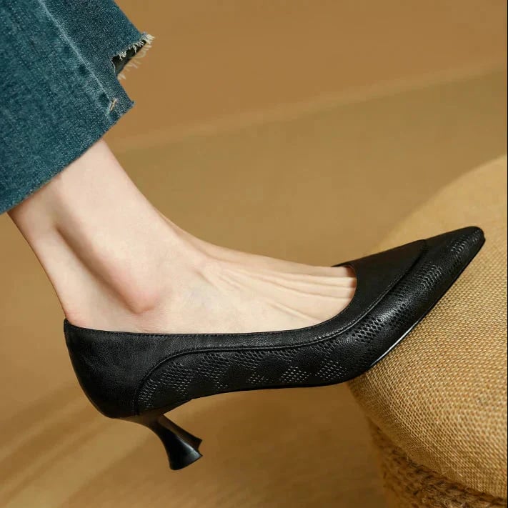 Paloma pointed toe kitten heel pumps in brown, sole view