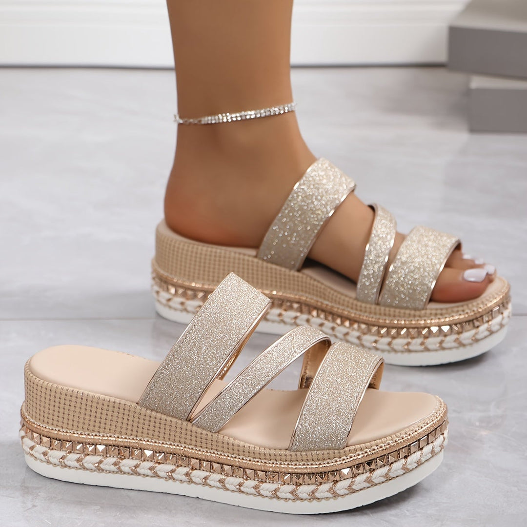 Close-up of Pamela sandal metallic sheen and delicate glitter strap detail