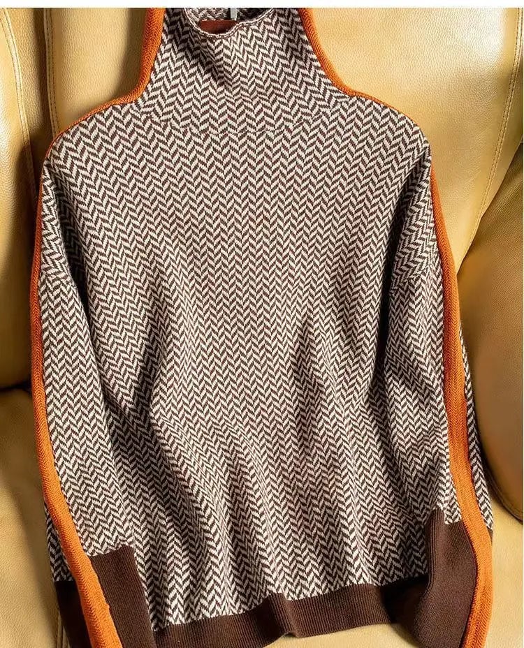Front view of the BobaFashion herringbone luxe turtleneck in orange, showing the textured pattern and fitted silhouette