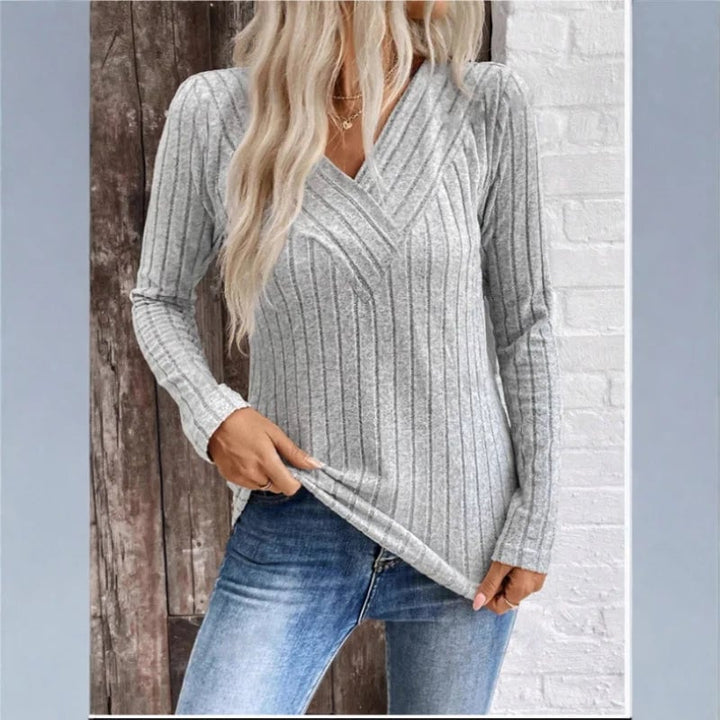BobaFashion sunken stripe sweater in black styled with high-waisted trousers for a polished everyday look