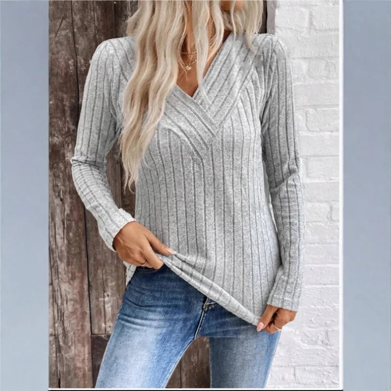 BobaFashion sunken stripe sweater in black styled with high-waisted trousers for a polished everyday look