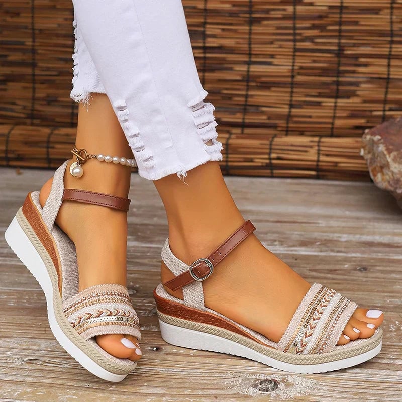 Top-down view of the Raven beige adjustable sandals highlighting the cushioned footbed and strap detail