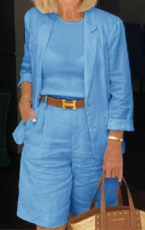 Reagan blazer and Bermuda shorts set in black, styled with heeled sandals, front view