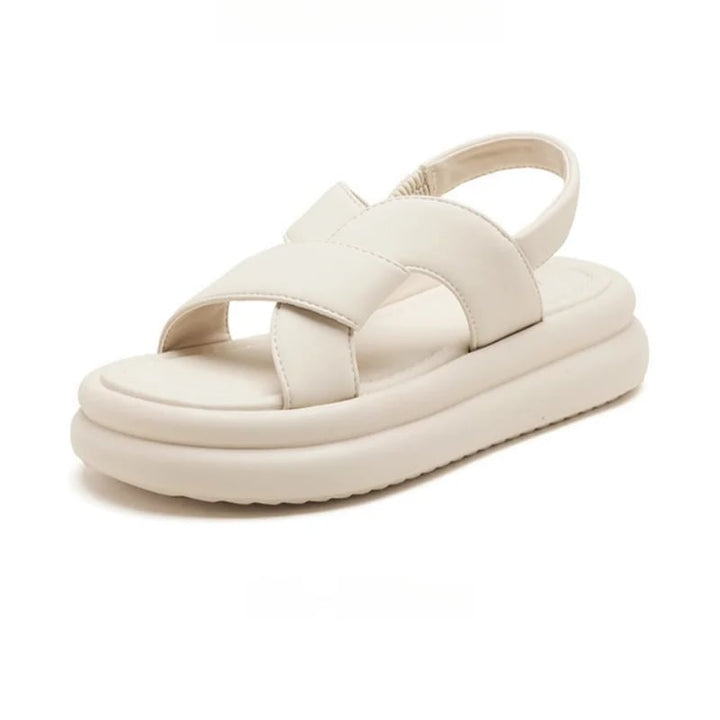 Pair of Reese orthopedic sandals in beige displayed flat on a clean white surface
