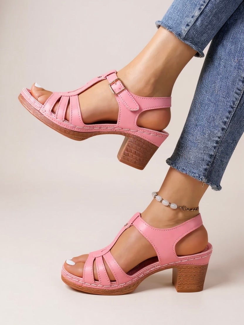 Saffron women's block heel sandal in a neutral colorway, front three-quarter view showing cushioned insole and sturdy heel