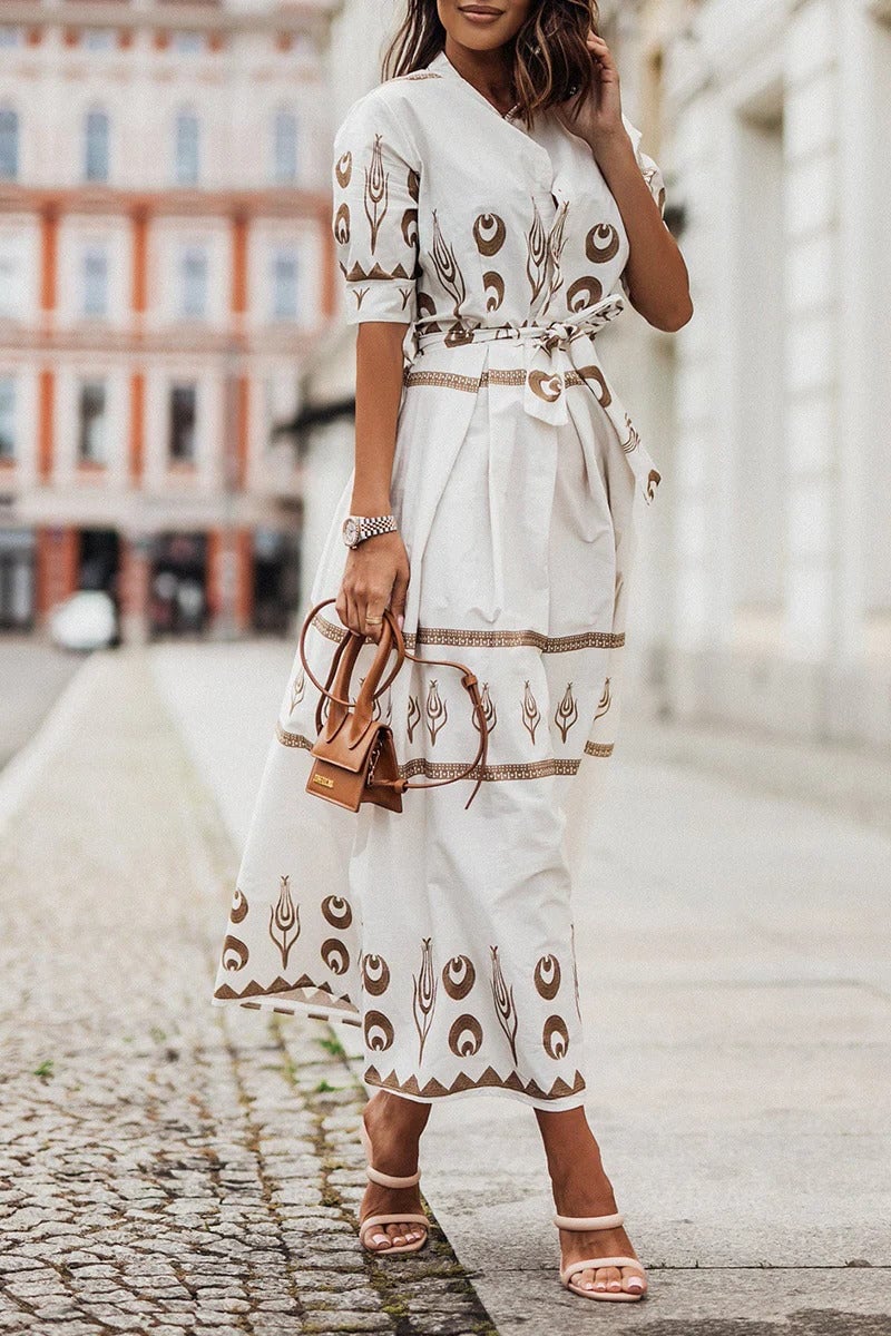 Close-up of the boho geometric and crescent print detail on the Savannah midi dress in white