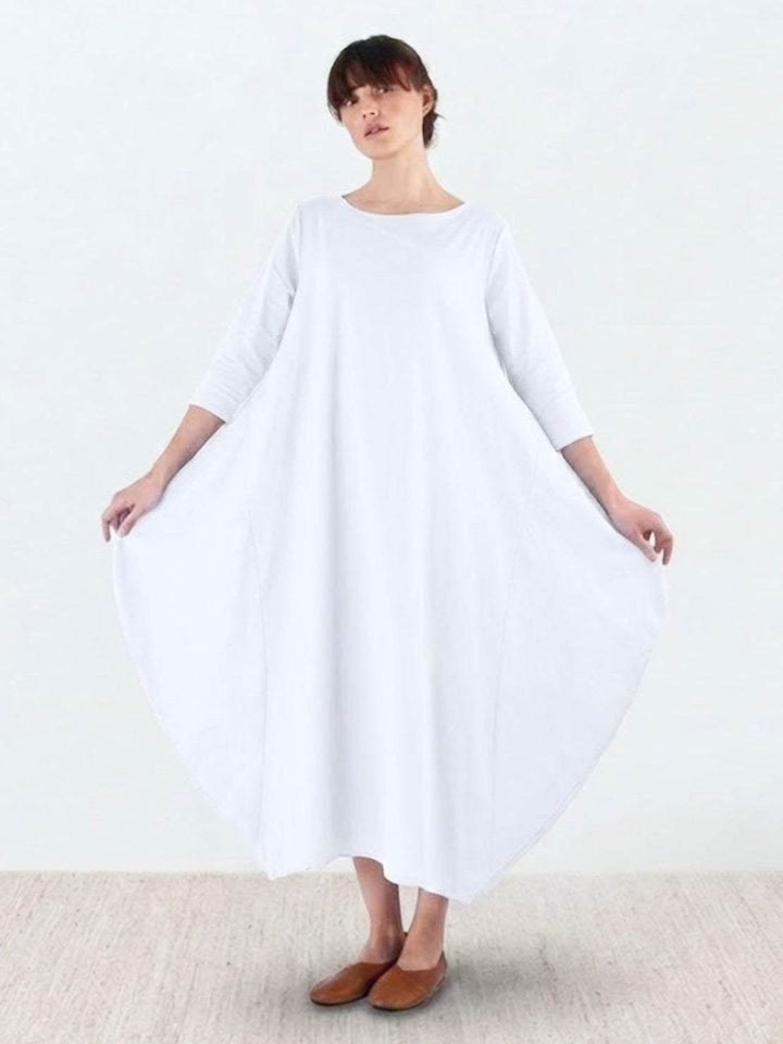 Side profile of the Serena boho maxi dress in Royal Blue showing relaxed oversized fit