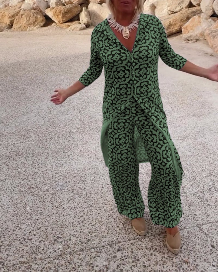 Side profile of the Serena green two-piece set showing the straight-leg pant silhouette