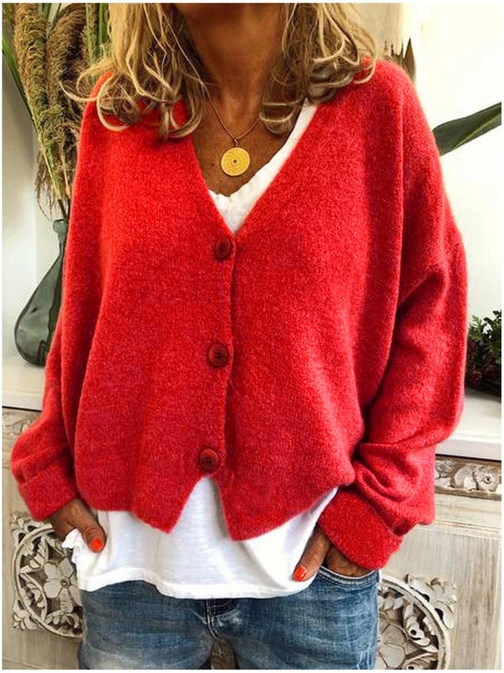 Model wearing the Shannon cardigan indoors, showcasing its cozy everyday versatility