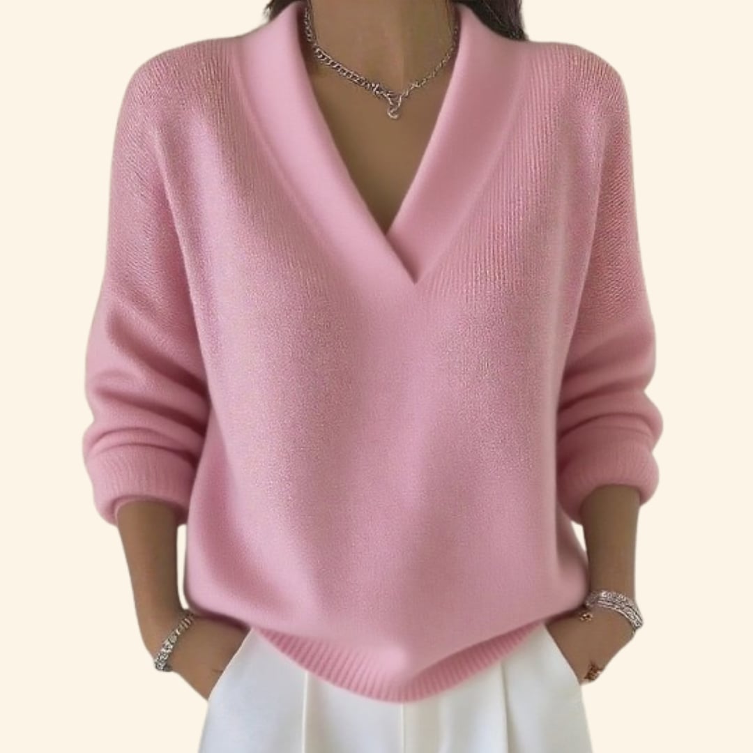 Close-up detail of the flattering V-neckline on a lightweight women's blouse