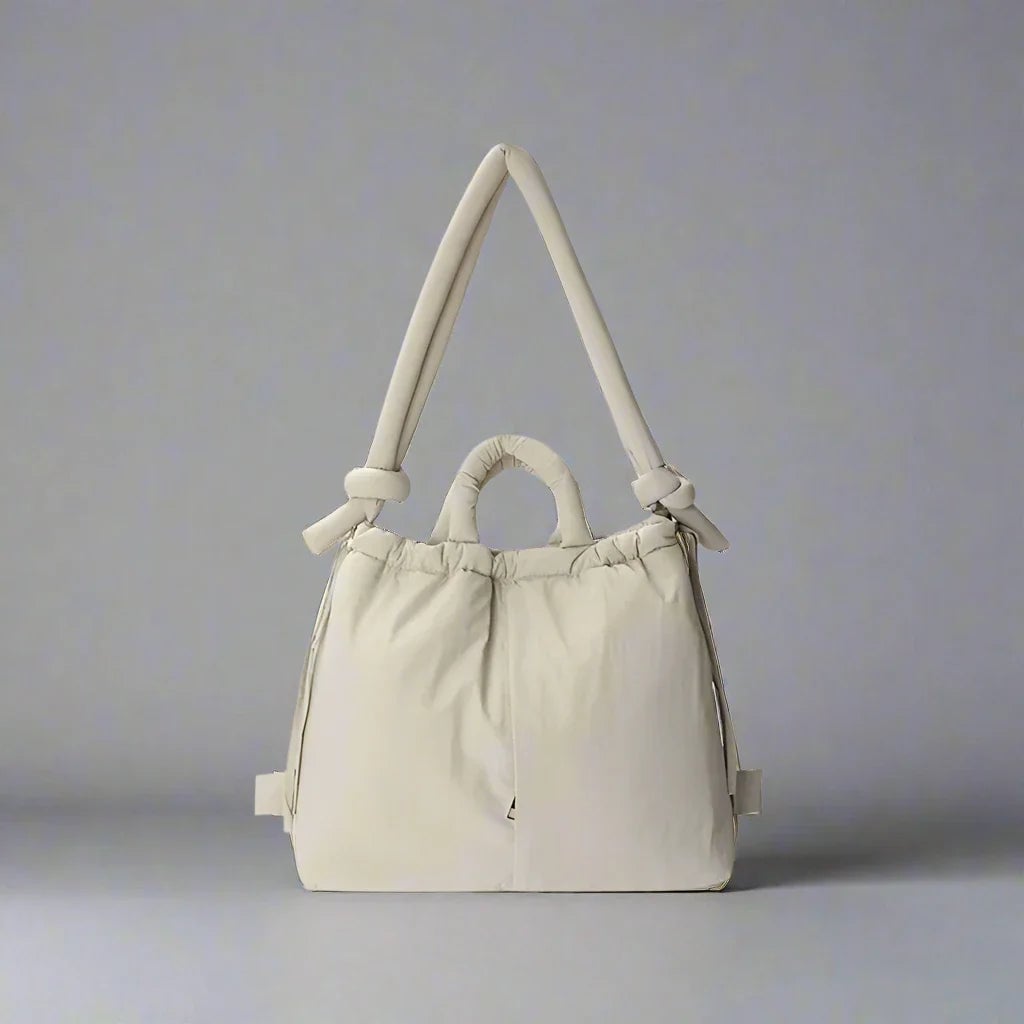 Flat lay of Sienna quilted puffer tote bag in Light Green