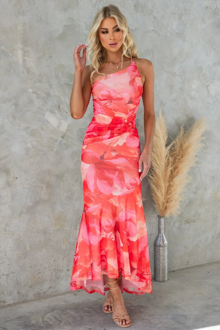 Front view of the Solange floral dress in purple showing its flattering feminine fit