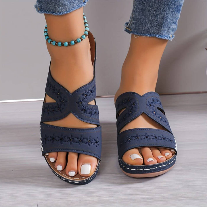 Women's orthopedic sandals in black colorway displayed on a clean white background