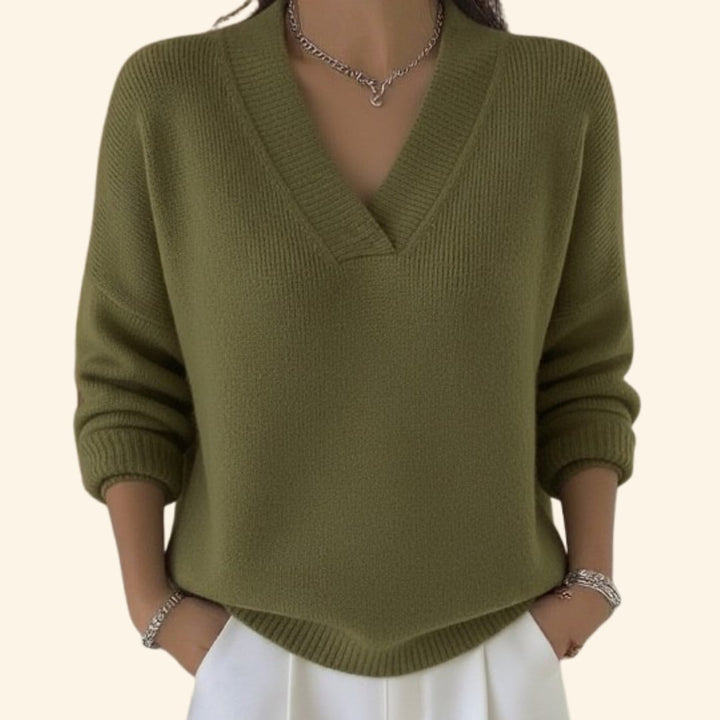 Sonia relaxed V-neck sweater styled with high-waisted jeans for an effortless casual look