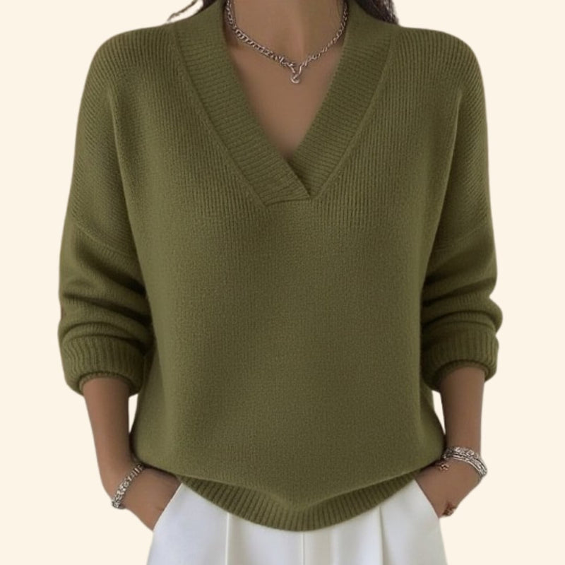 Sonia relaxed V-neck sweater styled with high-waisted jeans for an effortless casual look