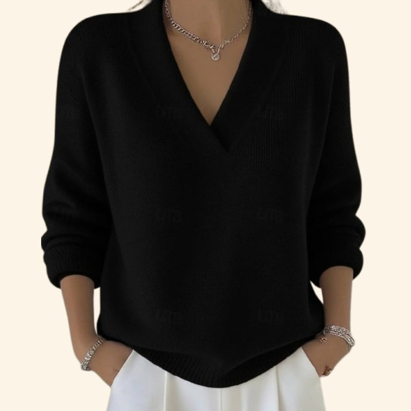 Flat lay of the Sonia V-neck sweater showing the relaxed silhouette and soft knit construction