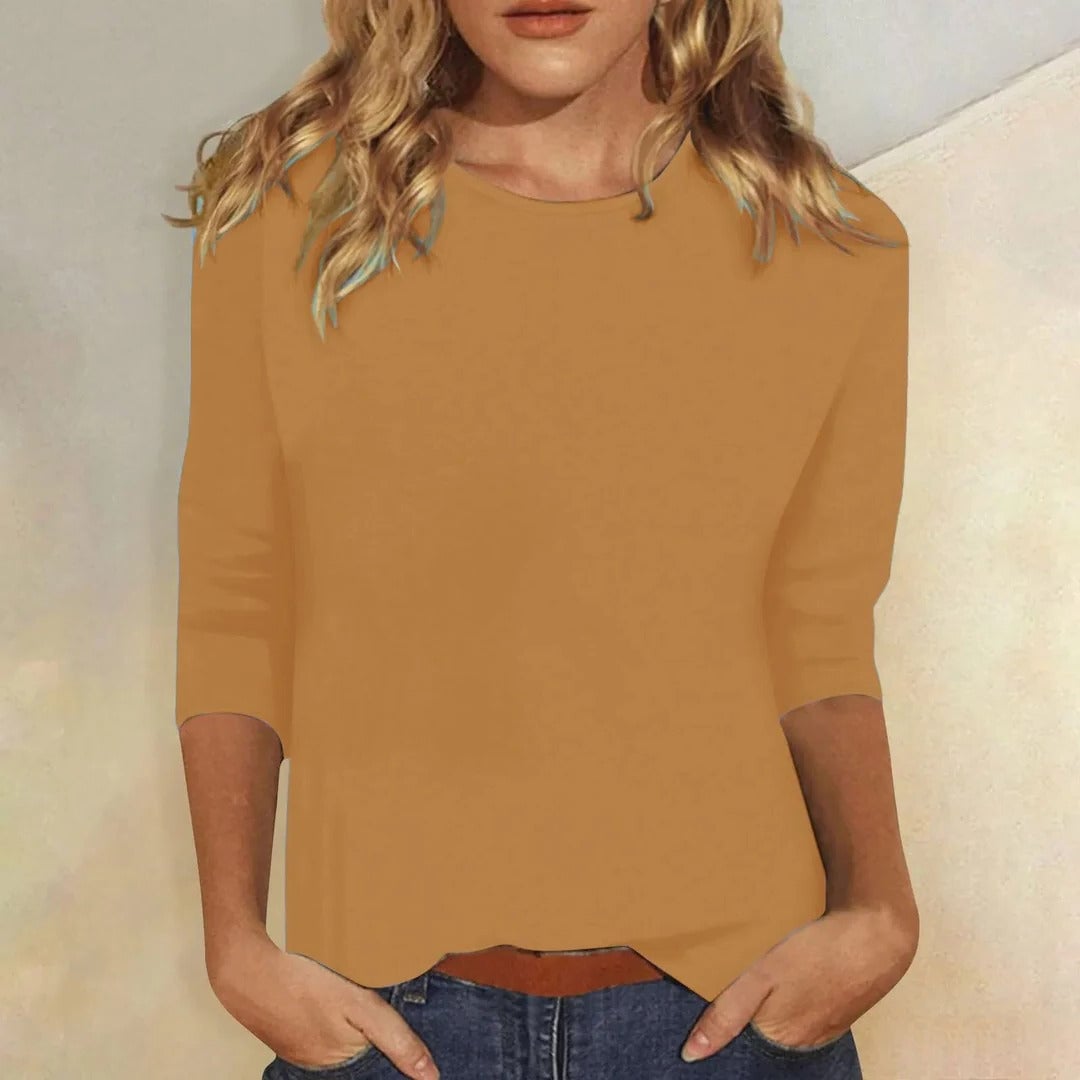 Flat lay of the Stella top showing multiple color options available at BobaFashion