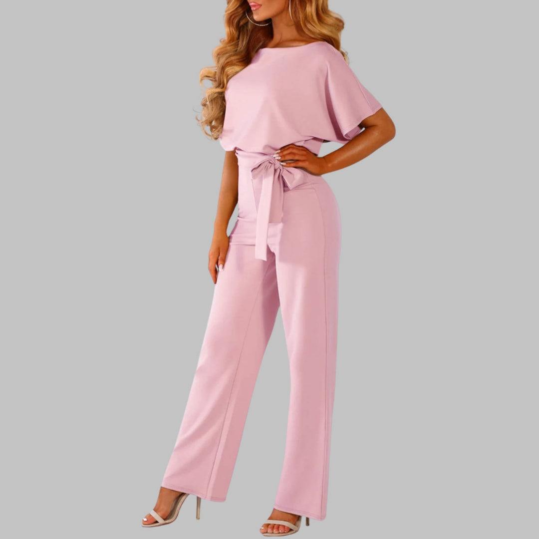 Close-up of the self-tie waist belt on the Sunny wide-leg jumpsuit in yellow