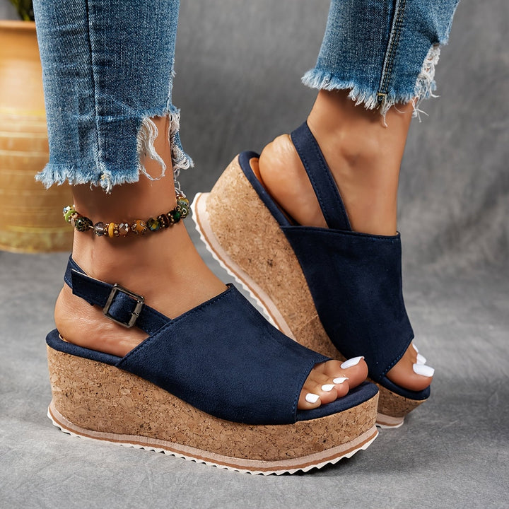 Terra platform sandals in all three colorways — black, brown leopard, and navy blue — displayed together