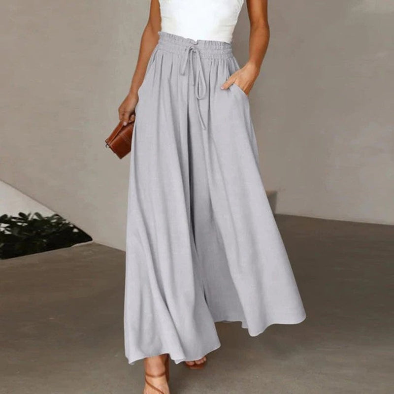 Back view of Terra wide leg pants highlighting the clean, fluid drape