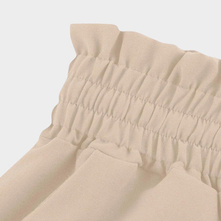 Detail shot of the Terra wide leg pants fabric and color, showing texture and drape