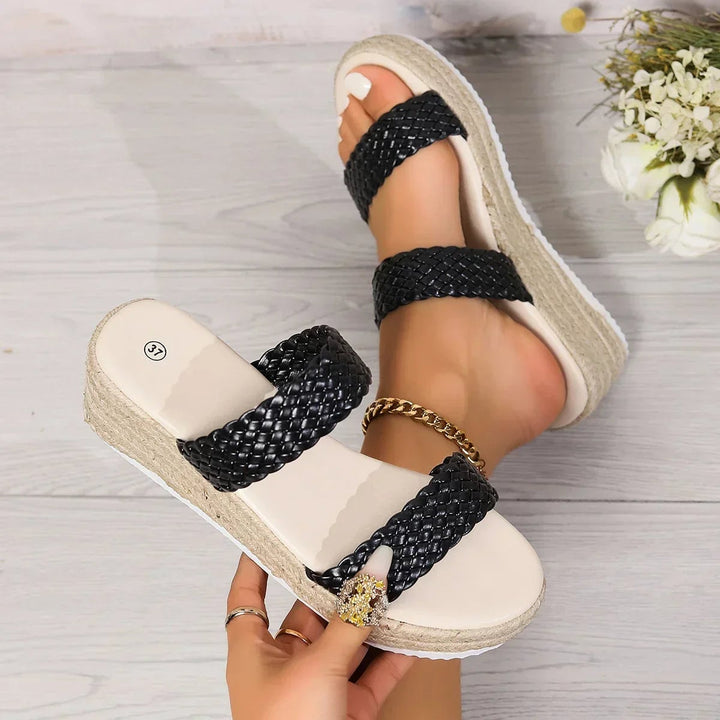 Theodora beige wedge sandals styled with a flowy summer dress, lifestyle shot