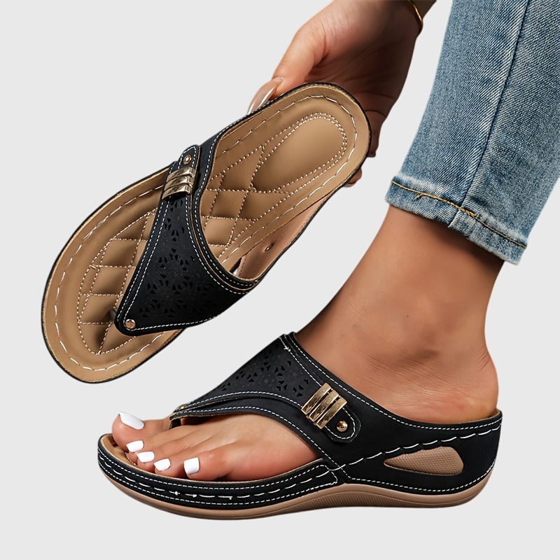 Women's platform ankle strap sandals in black, front view on white background