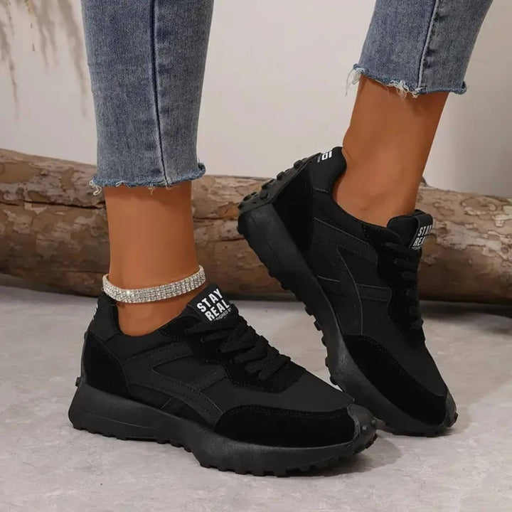 Side profile of orthopedic sneakers highlighting lightweight flexible construction and anti-slip outsole