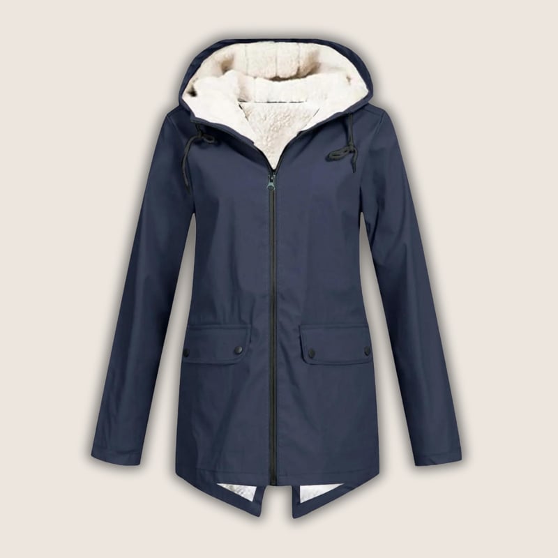 Close-up of ThermaShell rain jacket showing waterproof fabric texture and secure zip pockets