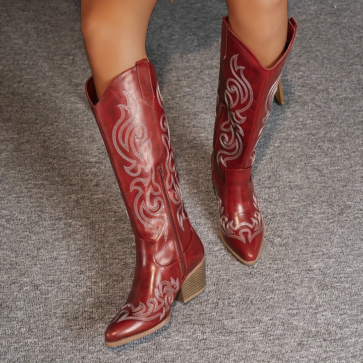 Brown Winter Grace boots styled with a midi skirt for a feminine winter look