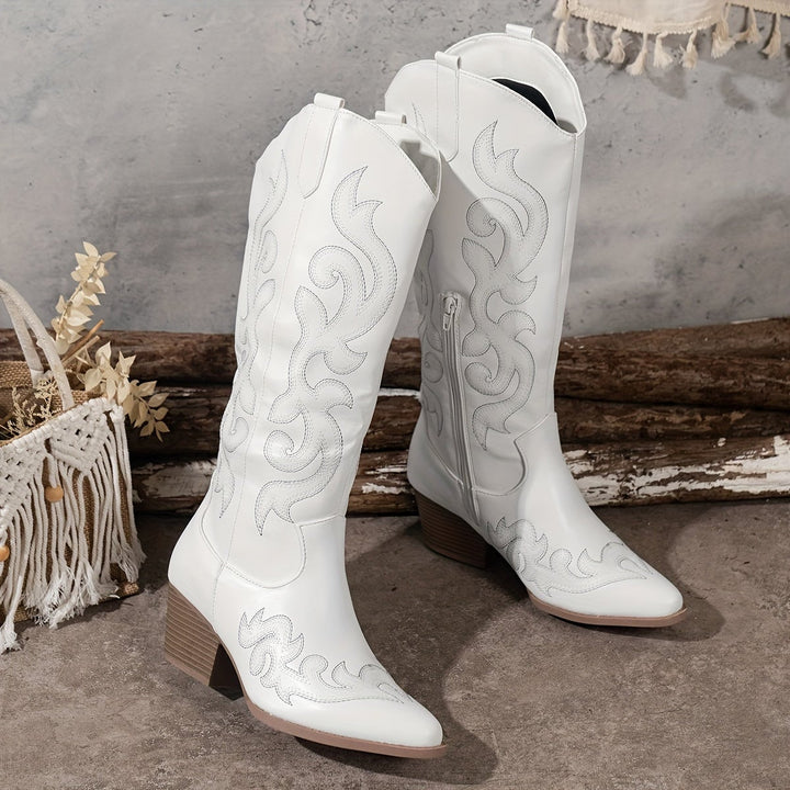 Side profile of the red Winter Grace boot highlighting the smooth silhouette and calf height