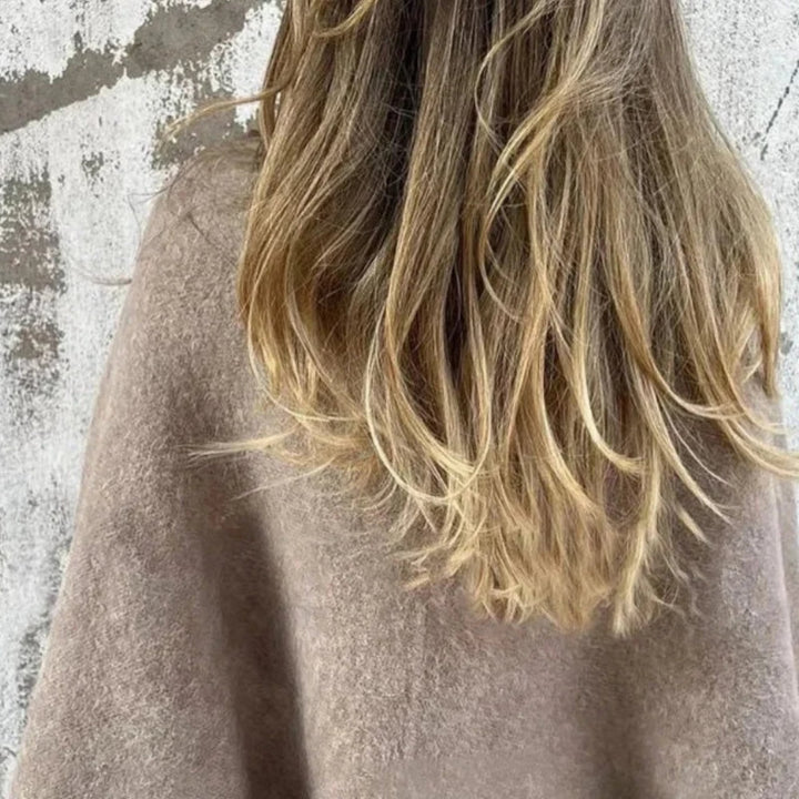 Close-up detail of the round neckline and premium fabric of the BobaFashion elegant coat