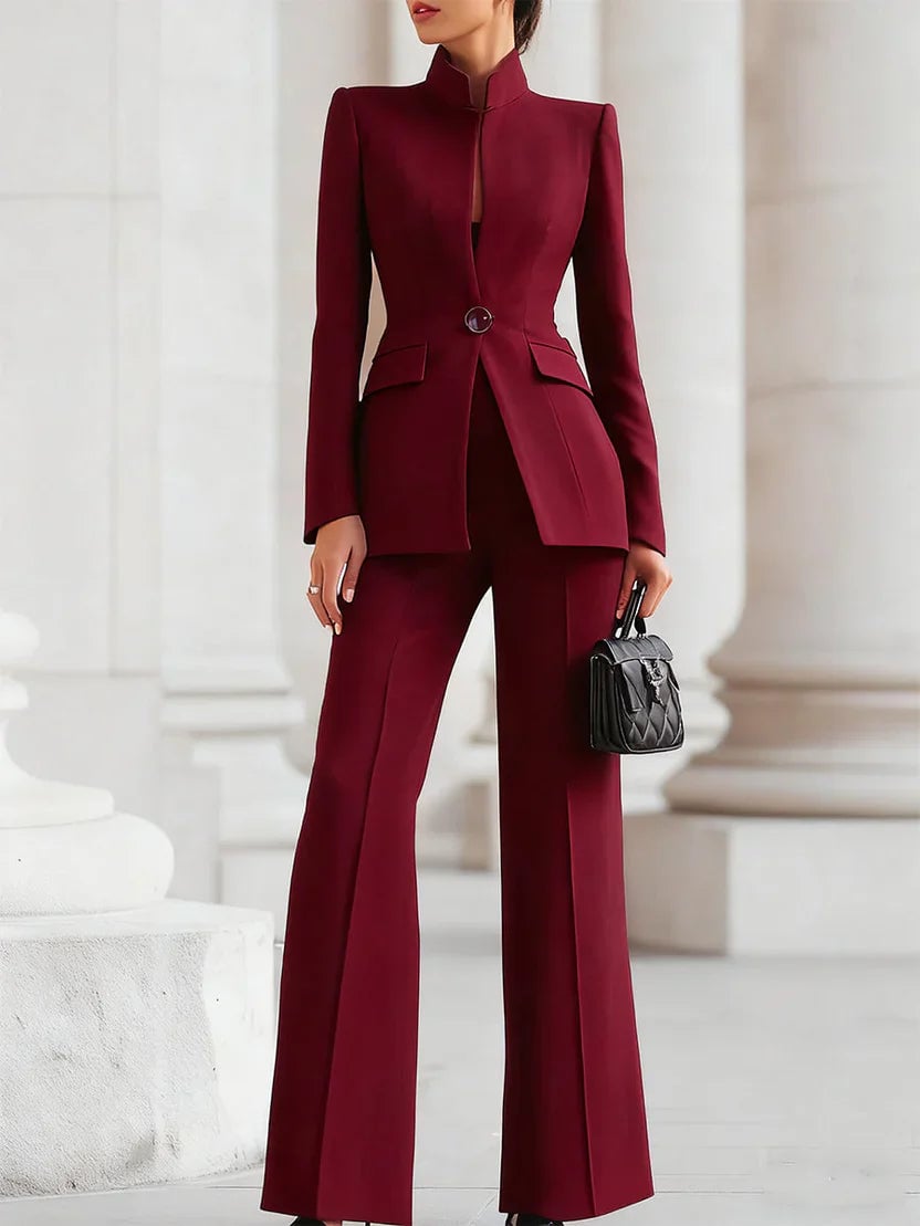 Side profile of the Vina two-piece suit set highlighting the elongated blazer length