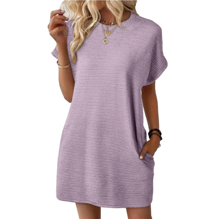 Close-up of the cuffed short sleeve detail on the Vivid mini dress in Light Purple