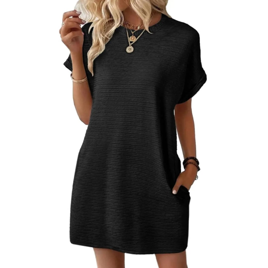 Detail shot of the seamless side pocket on the Vivid ribbed mini dress