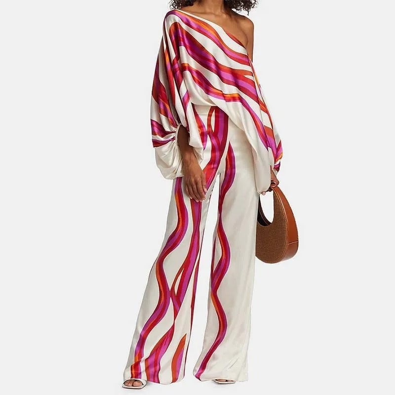 Front view of the fuchsia and red wave stripe off-shoulder two-piece set with wide-leg pants from BobaFashion