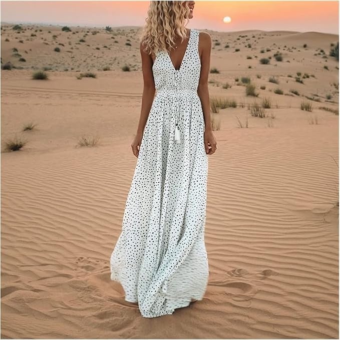 Close-up of the soft polka dot print and draped neckline detail on the Waverly maxi dress in white