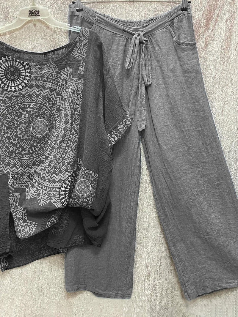 Front view of the Zahara mandala print co-ord set in gray showing the relaxed wide-leg trousers and bold tonal print top