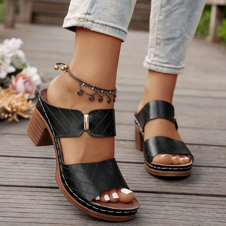 Zelda women's sandal in beige, side profile showing sleek silhouette