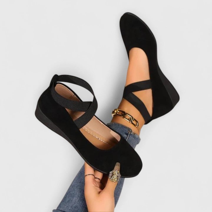Zephyra cross strap Mary Jane flats in black with wrap-around strap detail, front view