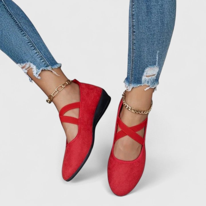 Zephyra cross strap flats styled with a casual everyday outfit, multiple color options shown